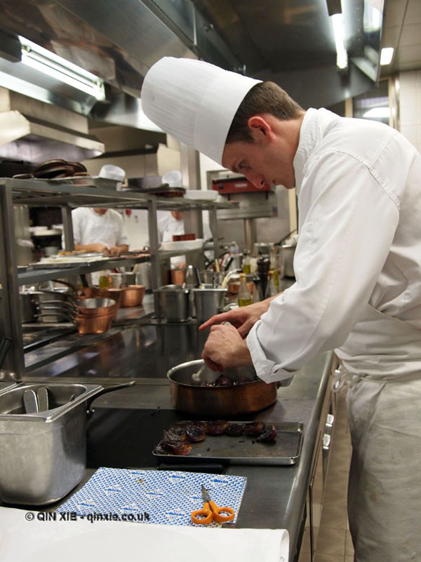 Chef making caramelised onions, 25th Anniversary Celebration Menu at Alain Ducasse&#39;s Le Louis XV ...