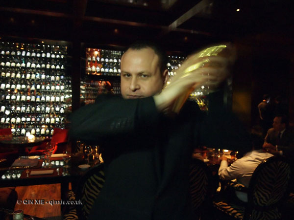 Davide Guidi shaking cocktails at Amaranto Bar, Four Seasons London