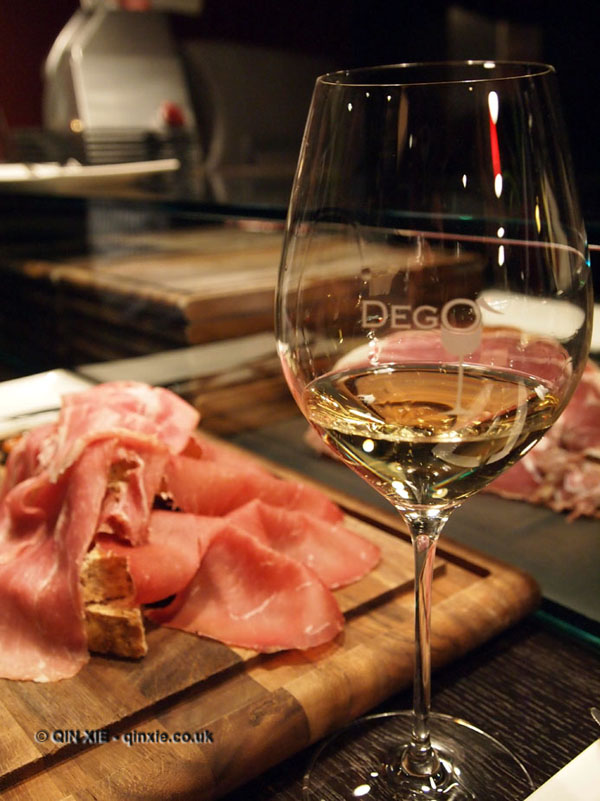 Charcuterie and Franciacorta wine glass at Dego, London