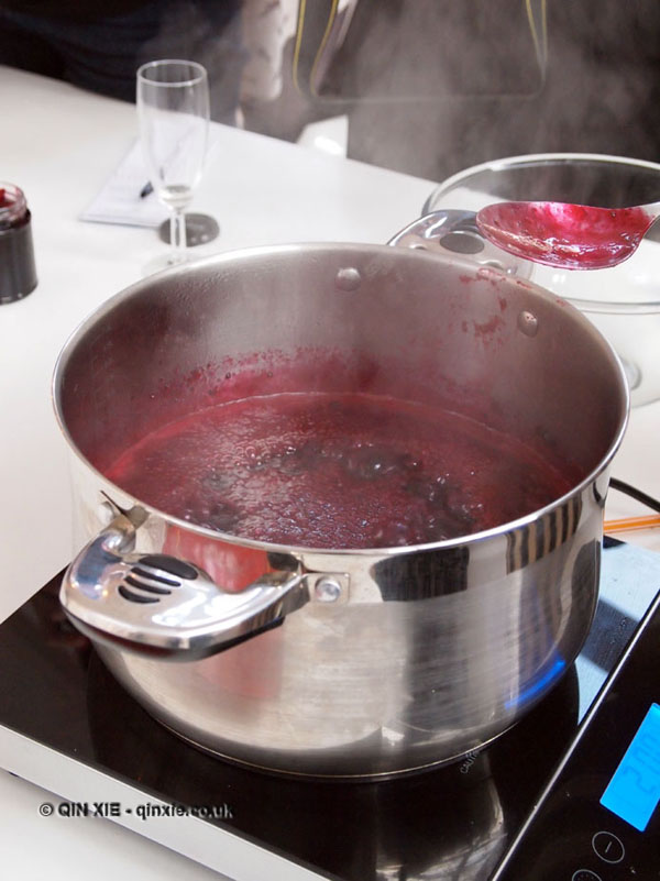 Blackcurrant and chilli jam bubbling in pan, jam making with Vivien Lloyd